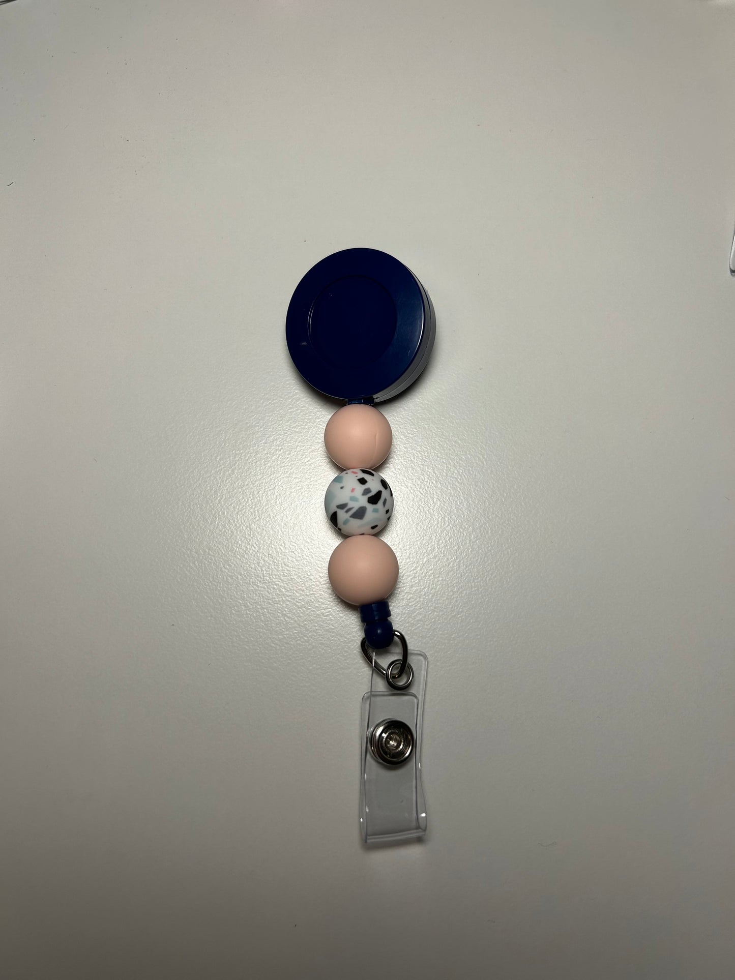 navy blue badge reel