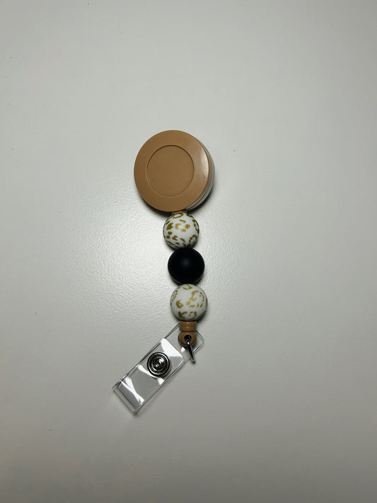 beige badge reel