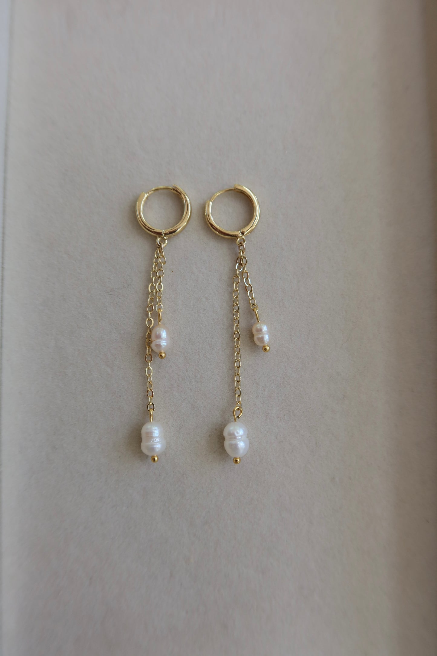 single dangle pearl earrings